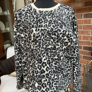 Black and cream-colored long-sleeve leopard print shirt